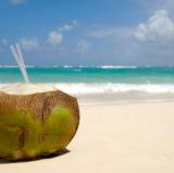 A Thai Beach with a cold coconut<br />photo credit: drinkpura.com